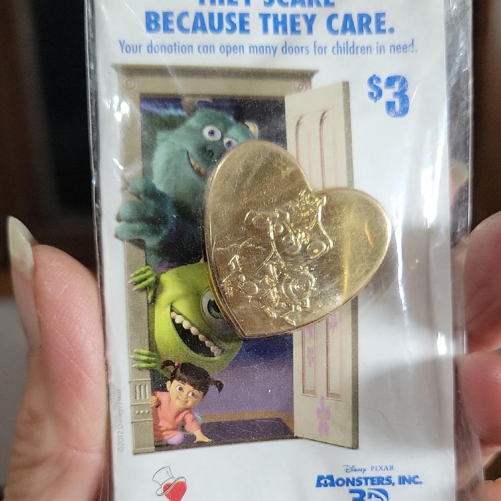 Monsters Inc Heart-Shaped Gold Pin